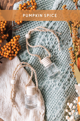 a bottle of pumpkin spice sitting on top of a towel